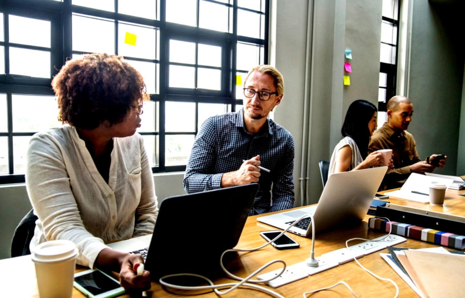 Budget planning session with financial forecasting documents